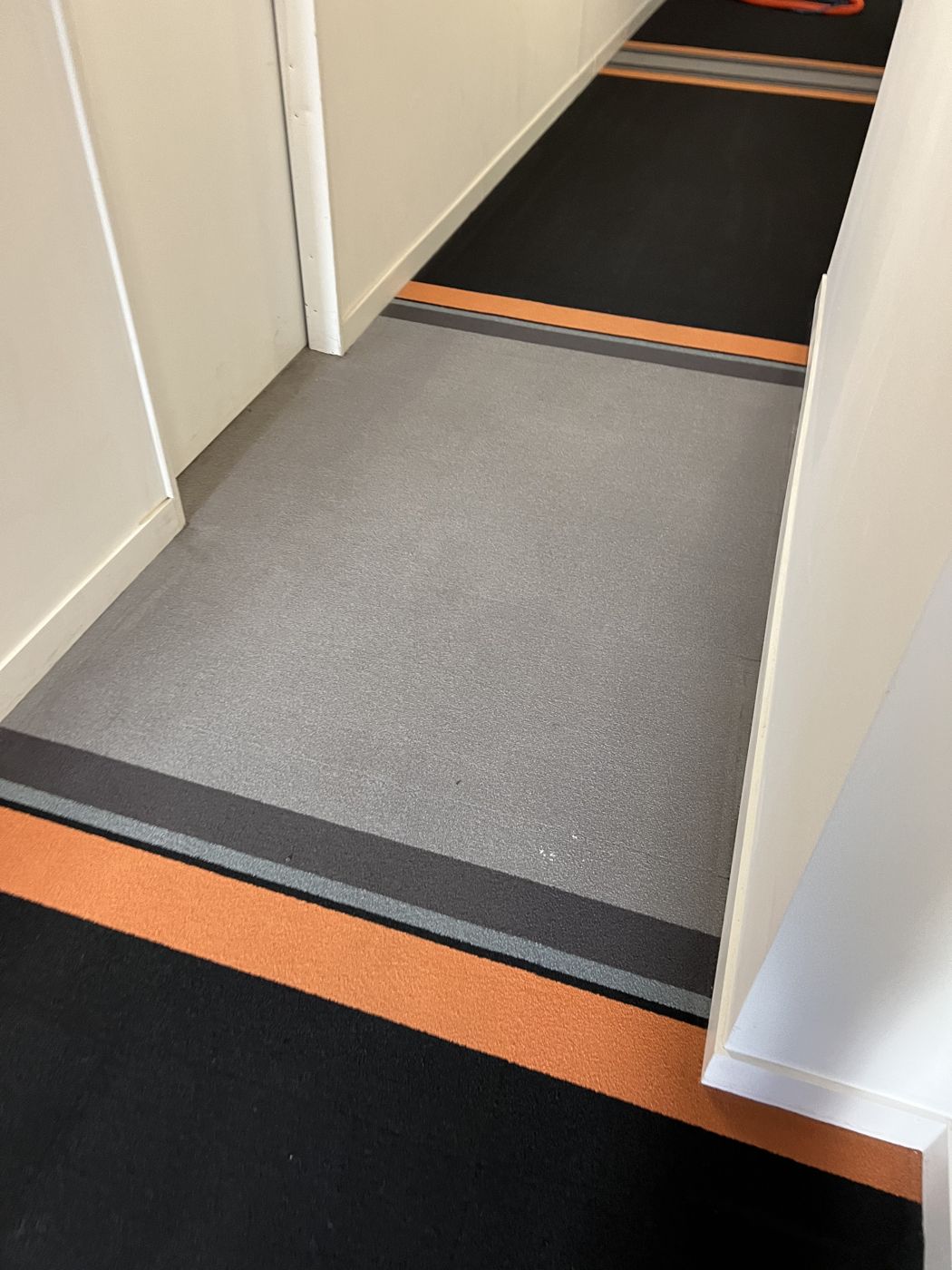 After — cleaned corridor carpet