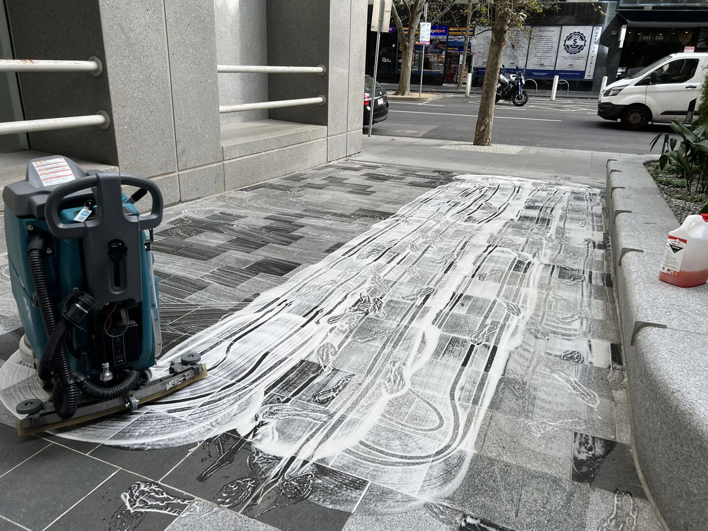 Exterior hard-surface scrubbing