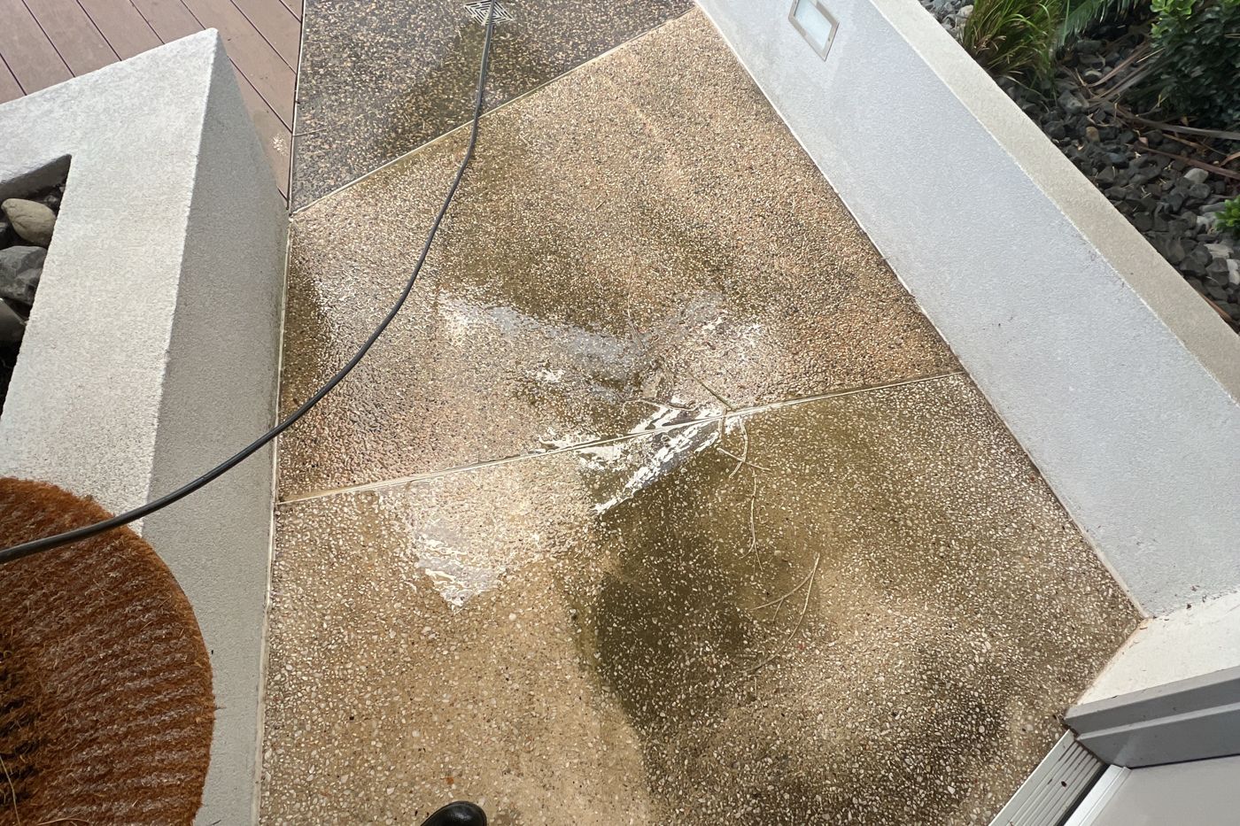 Before — grimy terrazzo entrance